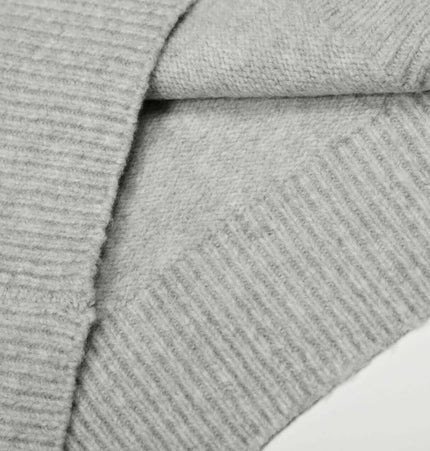 Loose Buttoned Turn Down Collar Sweater fabric detail showing soft polyester knit and comfortable texture.