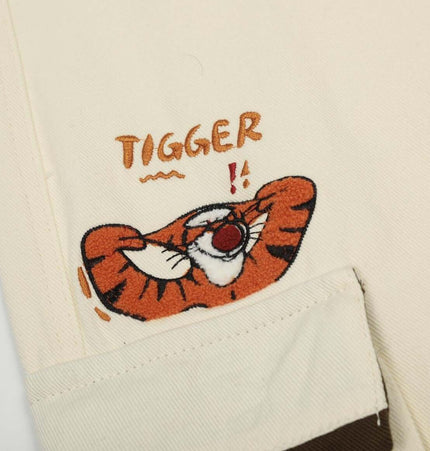 Loose Fit Cartoon Patchwork Pants featuring Tigger embroidery on the leg, adding playful character to casual style.