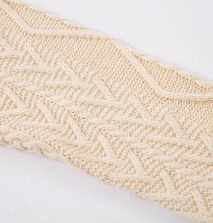 Close-up of the textured knit pattern on a Loose Fit Knit Crewneck Sweater, showcasing its casual elegance.