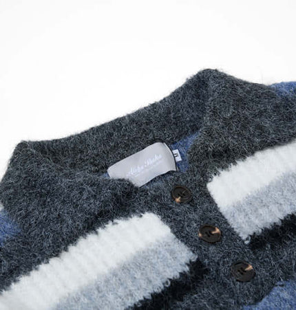 Loose Fit Stripe Polo Neck Sweater showing the flip collar and embroidered stripes in blue shades.