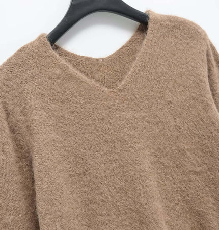 Loose Knit VNeck Top showing a camel-colored fabric with a v-neckline, perfect for casual styling.