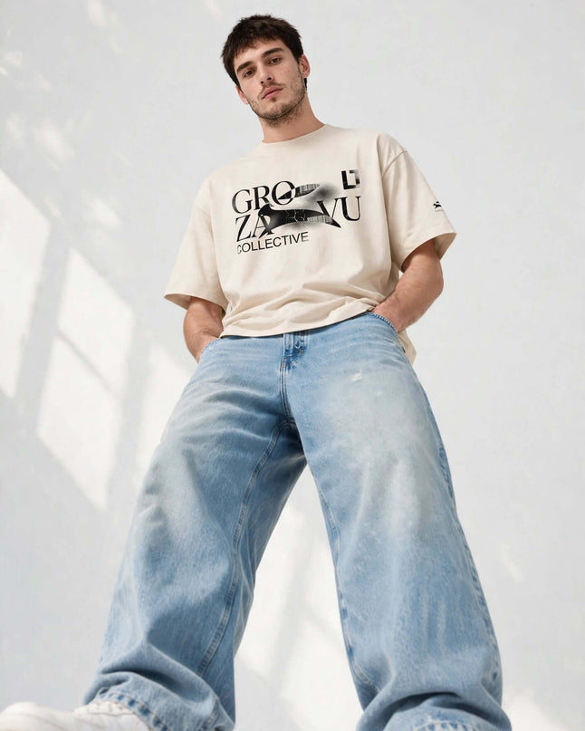 Low-angle editorial shot of the Icons Box Tee in Vintage White