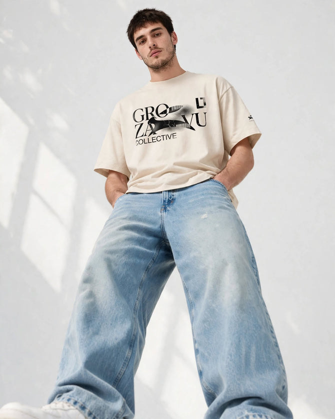 Low-angle editorial shot of the Icons Box Tee in Vintage White