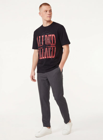 Close-up of Black bubble letter print short top fabric