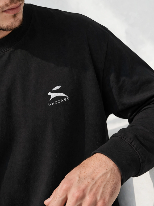 Macro of the 220 g/m² combed ring-spun knit on the black long sleeve tee