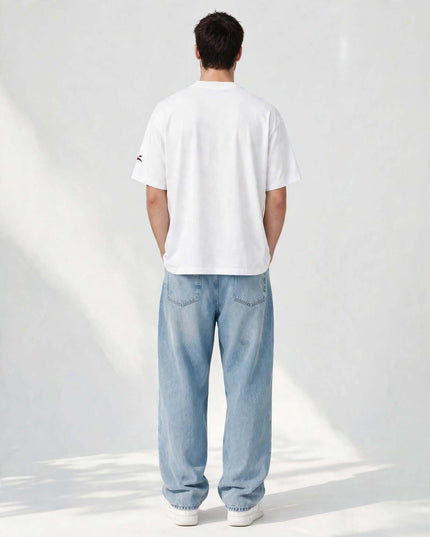 Back view of the white oversized heavyweight tee in 237 g/m² cotton