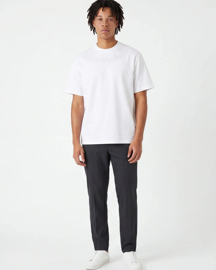 Front view of the Maison Grozavu Sleek Carbon Tee in shirt — showing the tailored hem.