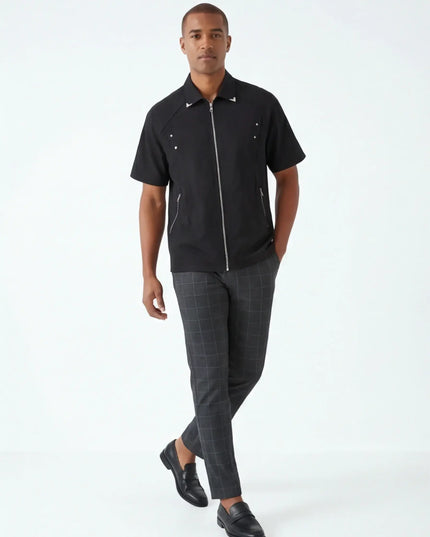 Front view of the Maison Grozavu Chalk Shorts Series in shorts — showing the tailored hem.