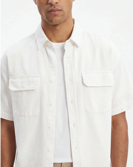 Front view of the Maison Grozavu Earth Shirt Mark in style — showing the effortless drape.