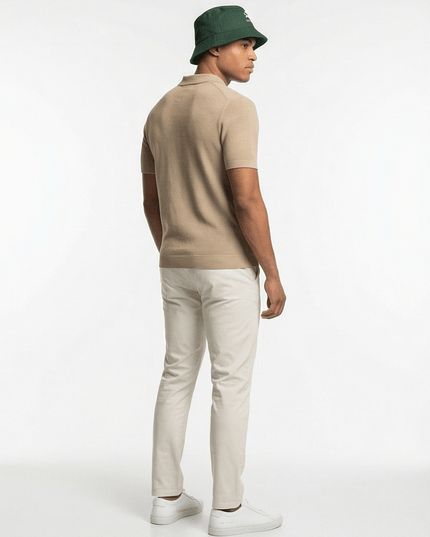 Front view of the Maison Grozavu Earth Cap Silhouette in hat — showing the sophisticated hardware.