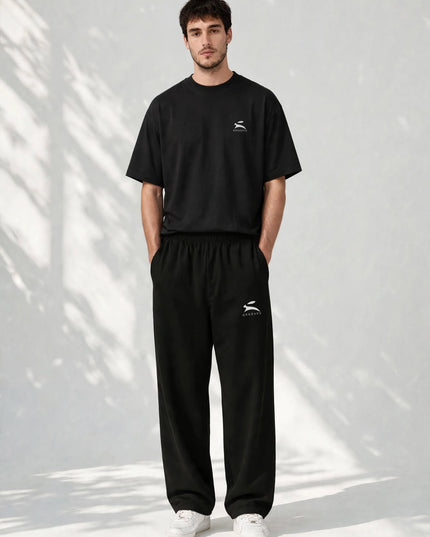 Men's black wide-leg pants in 300 g/m² cotton with elastane, front view