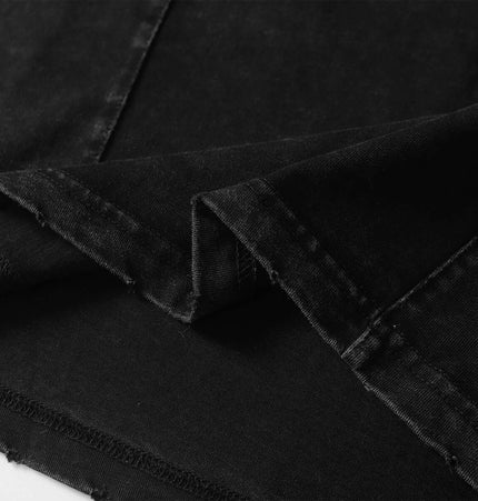 Close-up view of the fabric texture of the Mech Design Washed TShirt in black, showcasing its softness and quality.