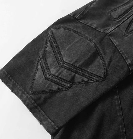 Close-up of the sleeve of a Mech Design Washed TShirt featuring a mechanical-inspired patch detail.