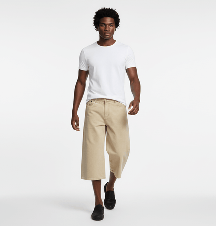 Elastic Waist Denim Shorts – Straight Fit model wearing beige shorts and a white t-shirt