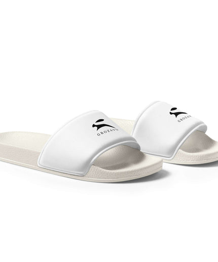 True Midnight Slides — right-side profile view showing the fitted silhouette and White colourway from the side
