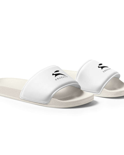 True Midnight Slides — right-side profile view showing the fitted silhouette and White colourway from the side