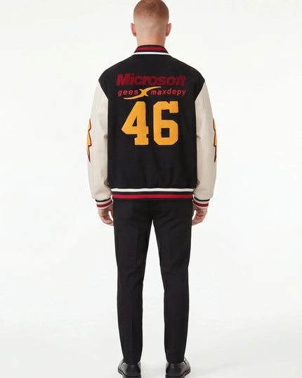 Rear view of the Maison Grozavu Enduring Obsidian Top in top — showing the sleek silhouette.