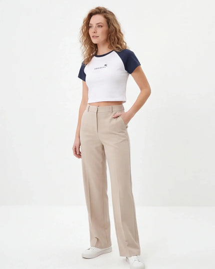 Front view of the Maison Grozavu Seamless Ash Crop Top in top — showing the tailored hem.