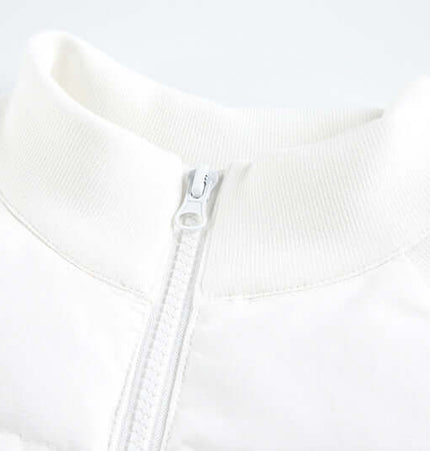 Stand Collar Short Down Jacket with minimalist design and zip closure, perfect for stylish winter fashion.