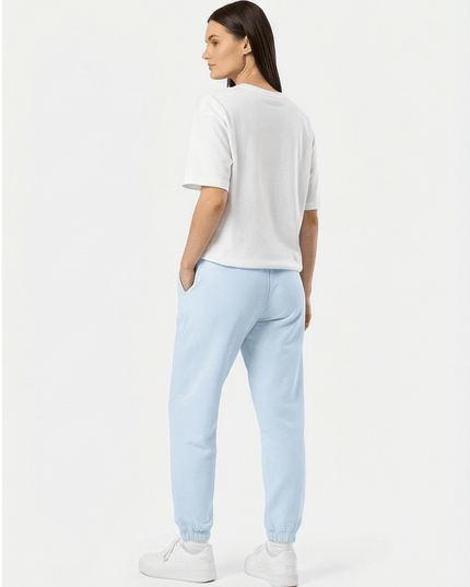 Rear view of the Maison Grozavu Timeless Umber Trousers in pants — showing the sophisticated hardware.