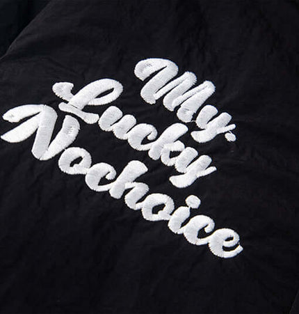 Embroidered detail on Fur Collar Embroidered Hooded Cotton Coat, featuring the phrase 'My Lucky Nochoice' in white.