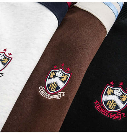 National Trend Retro Stripe Loose Shirt - close-up of embroidered designs on striped shirts in various colors