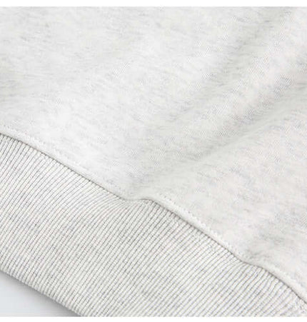 Close-up of the fabric and cuff detail of the National Trend Retro Stripe Loose Shirt in soft cotton blend.