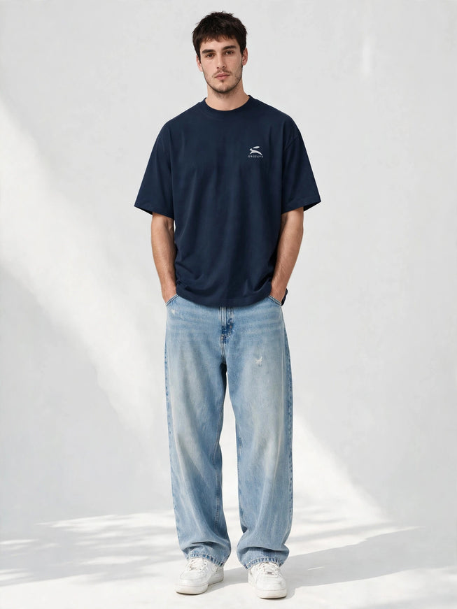 Navy oversized organic tee in 200 g/m² GOTS cotton, worn front view