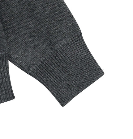 Notch Lapel Knit Sweater - Loose Fit sleeve detail showcasing ribbed cuff and smooth texture.