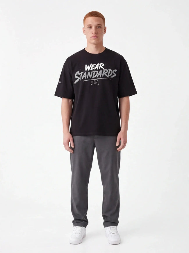 Flint Tee Weave lifestyle shot — natural drape of the 300 g/m² cotton-elastane fabric under directional light