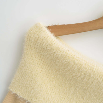 Close-up of the neckline of the One Shoulder Long Sleeve Office Casual Top, showcasing its soft yellow fabric.