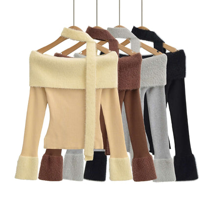 One Shoulder Long Sleeve Office Casual Top in multiple colors hanging on display.