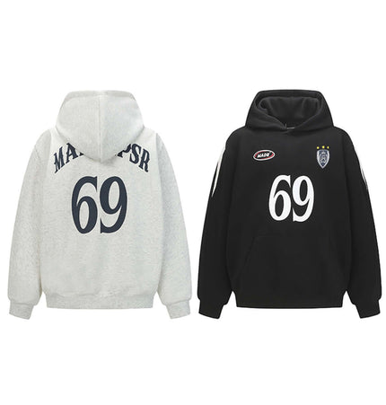 Oversized Hooded Sweatshirt – Loose Fit in white and black with large lettering on the back and front.