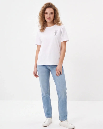 Tailored Monochrome Tee White — lifestyle detail of the organic cotton behaving in natural light