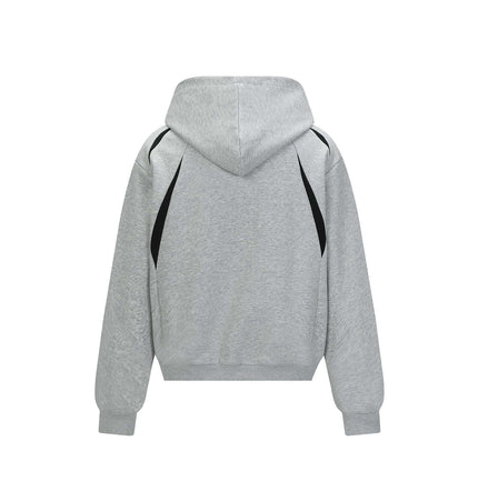 Back view of Patchwork Embroidered Hoodie – Loose Fit in gray fabric with hood and black accents.