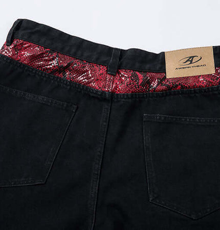 Patchwork Straight Jeans – Loose Fit featuring snake pattern spliced waistband and modern black denim finish.