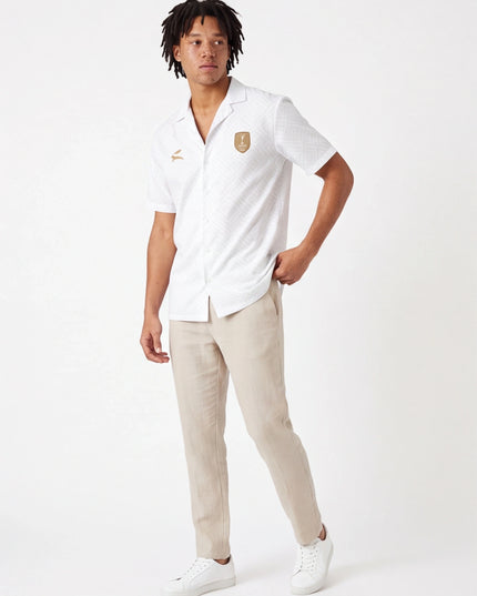 Maison Grozavu Bespoke Obsidian Shirt — side profile view showing the shoulder drop and sleeve length