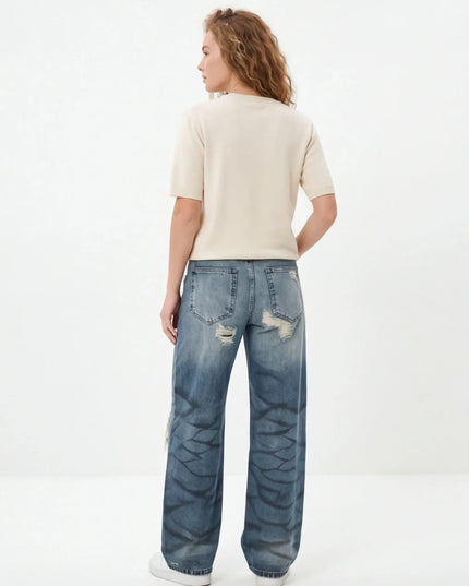 Maison Grozavu Quiet Eclipse Top — side profile view showing the shoulder drop and sleeve length