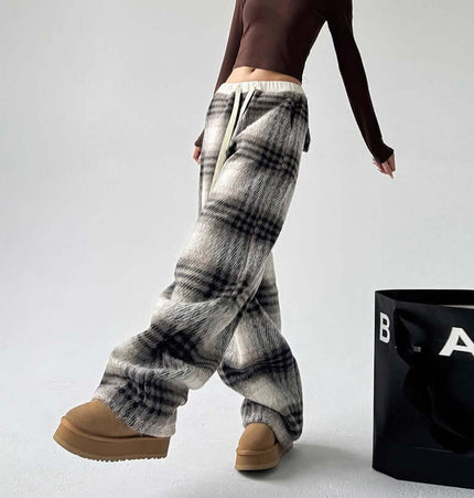 Plaid Flannel Fleece Lined Winter Pants featuring a stylish checkered design and fleece lining for warmth.