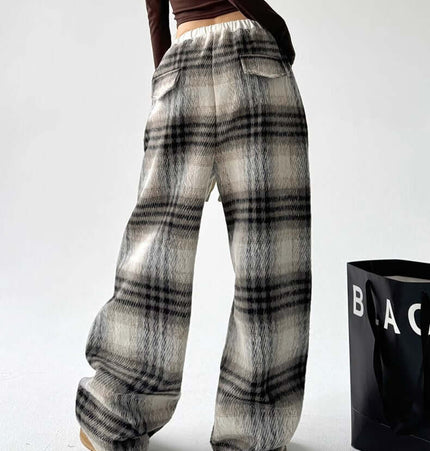 Plaid Flannel Fleece Lined Winter Pants showcasing a stylish checkered design and relaxed fit for chilly weather.
