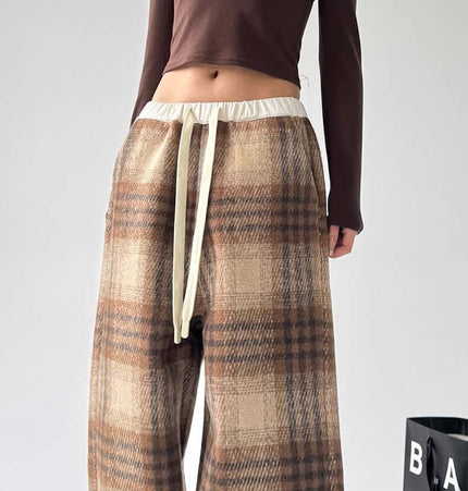 Plaid Flannel Fleece Lined Winter Pants featuring a relaxed fit and stylish design, perfect for colder seasons.