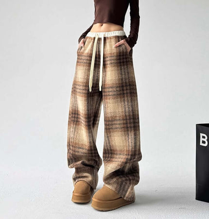 Plaid Flannel Fleece Lined Winter Pants featuring a classic checkered pattern for comfort and style.