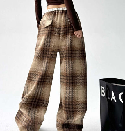 Plaid Flannel Fleece Lined Winter Pants featured in a stylish outfit, showcasing a retro checkered design