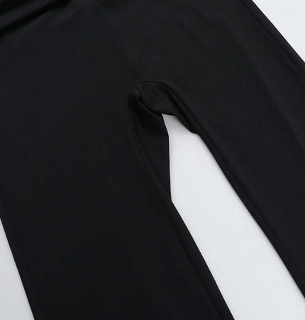 Close-up of pleated long pants from the Pleated Vest Two-Piece Set – Loose Fit in black fabric.
