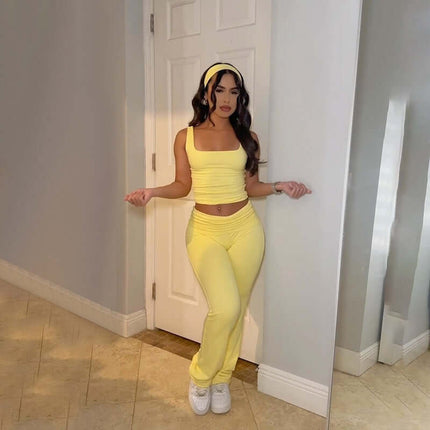 Pleated Vest Two-Piece Set – Loose Fit in vibrant yellow with a sleeveless top and matching long pants.