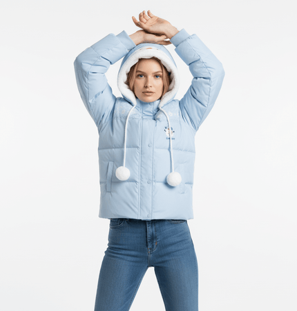 Model wearing a stylish Plush Hooded Cotton Coat in light blue with cartoon pattern and cozy hood, ideal for winter.