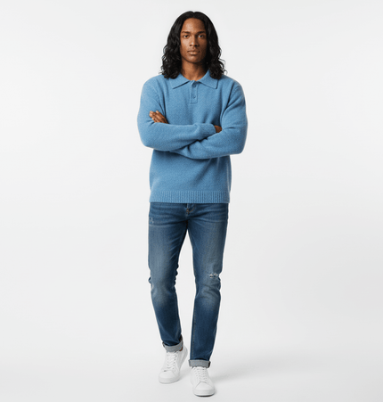 Polo Neck Knit Sweater - Loose Fit in blue worn by model, showcasing casual and comfortable style with jeans.