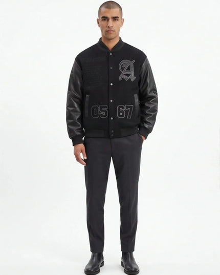Front view of the Maison Grozavu Resilient Ecru Top in top — showing the sophisticated hardware.