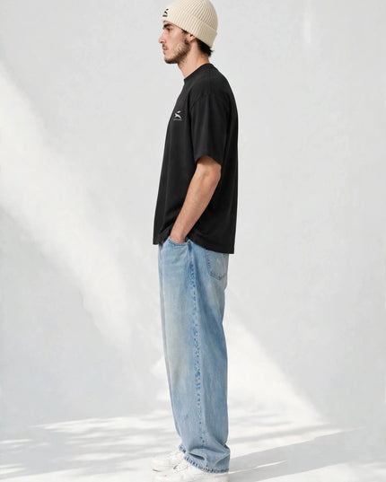 Full-body profile wearing the ribbed-knit fisherman beanie
