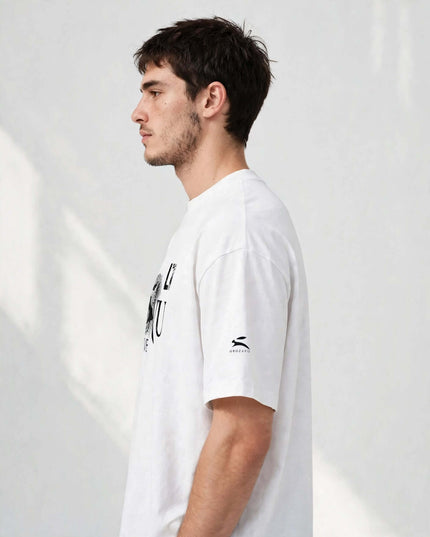 Side profile showing the sleeve logo on the White Icons Box Tee